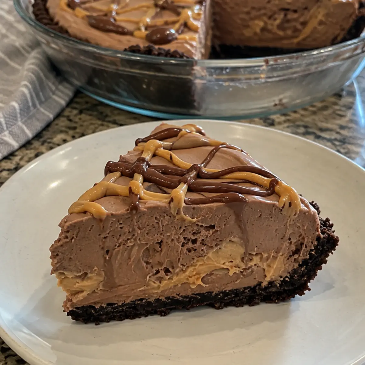 4-Ingredient Chocolate Peanut Butter Cool Whip Freezer Fudge Pie