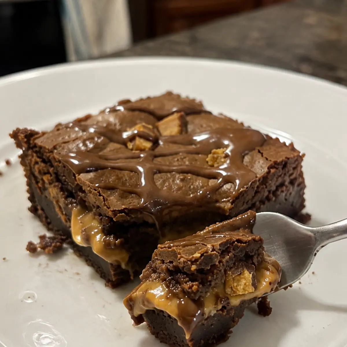 4-Ingredient Peanut Butter Brownie Cheesecake Butterfinger Dump Cake